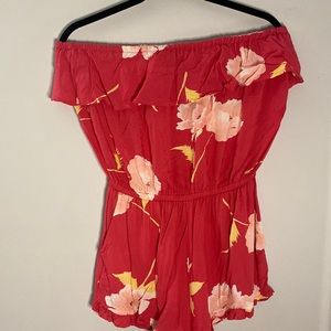 size medium red billabong romper.
